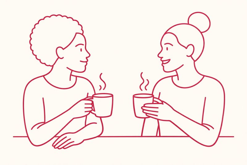 Two women enjoying a warm conversation over a cup of tea